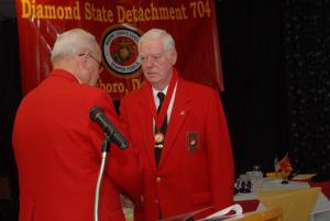 The Marine of the Year is also named at the Birthday Ball. Shown is Marine of the Year Phil Folan, right, being named by Commandant Rudy Swanson. BY STEVEN BILLUPS