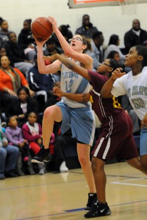 Mariner forward Paige Mohr hits two of her five points on the game. BY DAN COOK