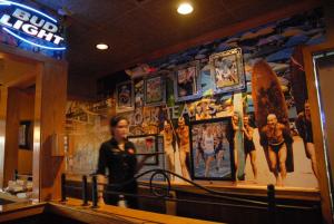 The interior features new artwork with a wall covered with local athletes and historical and contemporary murals of Rehoboth Beach.