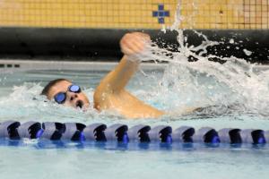Cape sophomore Luke DiGuglielmo scores during the freestyle leg of the medley relay. BY DAN COOK