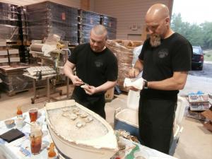 Eric Derr, left, and Chris Bisaha shucked all 500 Delaware Bay oysters donated by the sponsors. BY MOLLY MACMILLAN