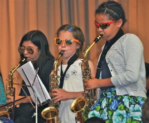 Performing on the saxophone are (l-r) Caitlin Gallager, Zoe Callard and McKayla Thomas. BY RON MACARTHUR