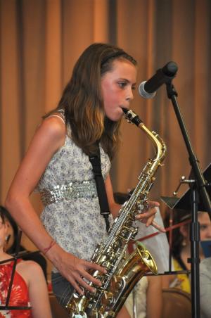 Macy Beach, a member of the Shields fifth-grade band, plays "Thriller" as a saxophone solo. BY RON MACARTHUR