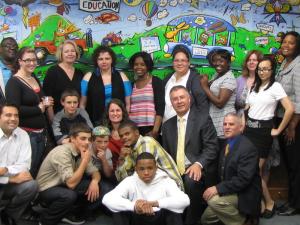 Not all the children who worked on the mural were identified because they are under 18 and need parental consent. The team members shown include Maegan Soll, Courtney Collison, Christella St. Juste, Samantha Monroe, Myiesha Miller, Tamyra Blake, Eric Lloyd, Bryan Samuels, Robert Hoyle, Claude Hoyle, and Billy Hoyle. Also in the picture are Division of Family Services Director Dr. Victoria Kelly, Deputy Director Rodney Brittingham, Independent Living Program Manager Felicia Kellum, three YAC advisors, Judge Peter Jones, and John Donato. BY SUBMITTED