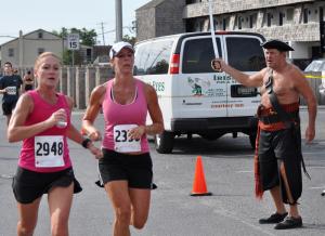 Pirate Pete Hartsock stood guard at the finish line as runners came barreling through. BY NICK ROTH