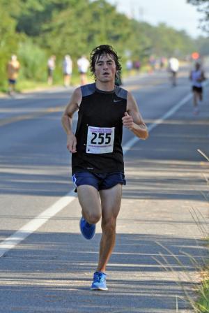 Joe Delclos of Warrenton, Va., finished fourth overall in 30:16. BY NICK ROTH