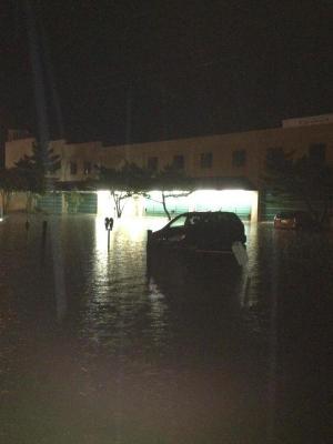 An auto is nearly submerged near Funland on Delaware Avenue in Rehoboth Beach. BY AUTUMN GARVEY