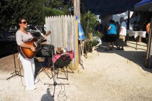 Musician Melissa Alesi provided the music for the event. BY STEVEN BILLUPS