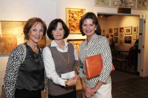 Viewing art and chatting are (l-r) Brenda Vizzi, Jean Stakias and Christine Moore. BY STEVEN BILLUPS