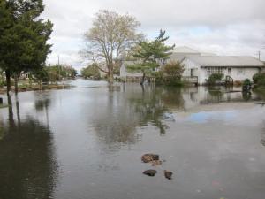 Market Street on the beach in Lewes is in one of the lowest lying areas of town and takes its good old time draining. This photograph looks northeastward toward the beach, just west of the intersection with Massachusetts Avenue.