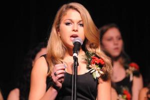 Singing a  solo, part of Irving Berlin's “Christmas.” is Alyssa Mocci.