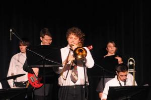 Soloing  on Pat Matheny’s “Dream of the Return”   is  trombonist  Avery Mallon. Shown  are (l-r) Zach McCann, Kearney   Mallon,  Avery  Mallon, Haley Will, Joel  Tylecki and Brooks Emery.
