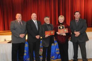 Rosemary and Chic Barici of Etched in Time Engraving were presented with an honorary membership for their years of contribution to the fire department. Shown are (l-r) Rich Bunting, Woody Magee, Rosemary and Chic Barici, and Troy Virden. BY STEVEN BILLUPS