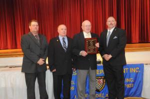 The Chief’s Award was presented to Bob Nicholson for his dedication to the department's fire prevention program. Shown are (l-r) Troy Virden, Wally Evans, Nicholson and Woody Magee. BY STEVEN BILLUPS