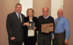 President Gary Bailey presents the past president gavel to William DelleDonne. Shown (l-r) are Bailey, Anne Marie DelleDonne, Past President William DelleDonne and Chief Harry Miller. BY WARREN JONES