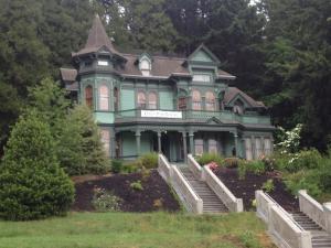 The Shelton-MacMurphey-Johnson House is a Queen Anne-styled house, built in 1888 for Dr. T. W. Shelton, and designed by Salem, Oregon architect Walter D. Pugh.
