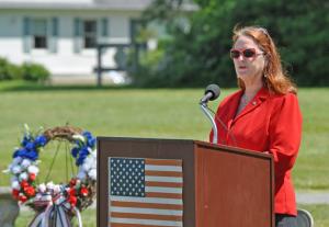 Milton Mayor Marion Jones reads the poem "In Flanders Fields." BY NICK ROTH