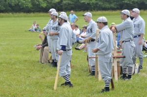 Lewes players watch the action during a game at the Virden Center. BY RON MACARTHUR