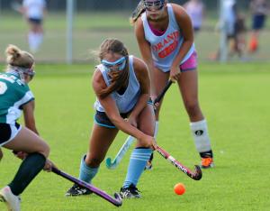 Beacon's Katie Frederick passes the ball upfield to a teammate. BY DAN COOK