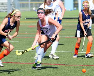Mariner eighth-grader Hannah Bieler races a Delmar midfielder to the ball during the scrimmage with the Wildcats. BY DAN COOK