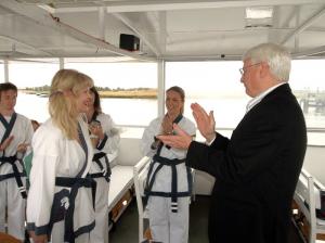 Kyo Sa and Coastal Martial Arts co-owner Nancy Evans is promoted to second-degree Black Belt with new second-degree Black Belts Alec Beck and Jessica Moore. Kyo Sa Nim and Coastal Martial Arts co-owner Karen Jacobi and Kwan Jang Nim Frederick Scott look on. SOURCE SUBMITTED