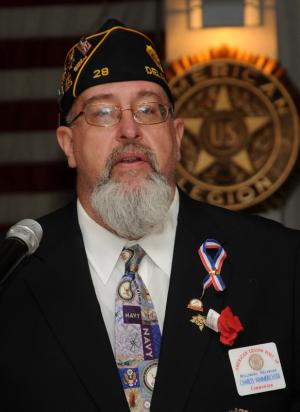 Post 28 Commander Charles Nimmerichter acted as emcee of the Veterans Day ceremony. "True Heroes have their name on the front of their uniform and not on their back," he said. BY DAN COOK