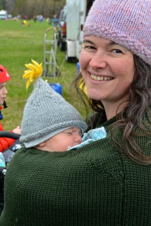 Mom Joan Greeley of Lewes wants her eight-week-old son, Benjamin, to learn about the festival at an early age. BY RON MACARTHUR