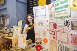 Adrienne Gage from Gage Family Beekeeping offered a sample and education about fresh honey. BY DENY HOWETH