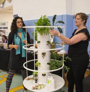 Dr. Amber Golshani, left, integrative and naturopathic doctor, and Tammy Foote, licensed medical technician, talk about the aeroponic tower garden. BY DENY HOWETH