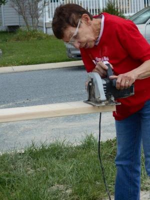 Susan Breznak helps build on site for the first time with Sussex Habitat. SOURCE SUBMITTED