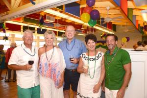 Ted and Pat Fischer, Bob Gibson, Linda Lee and John Mini prepare to party at the Mardi Gras theme benefit for the Children's Beach House. BY DENY HOWETH