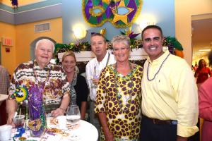 Dick Cecil, Janis Lopez, Ray and Kim Book, and Sen. Ernie Lopez, R-Lewes, gather in the main hall. BY DENY HOWETH
