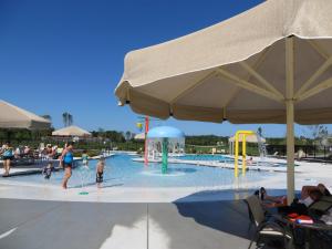 Amenities are already open in a community courtyard that features a playground, resort-style pool, fitness and wellness center, pub and crab shack. BY MOLLY MACMILLAN