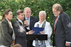 The Futcher family was presented with a House tribute. Shown are (l-r) June Rose Futcher, Rep. Steve Smyk, Speaker of the House Pete Schwartzkopf, June Rose Futcher and Bob Futcher. BY NICK ROTH