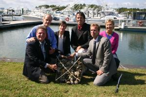 Shellfish aquaculture supporters (l-r) DNREC Secretary David Small, U.S. Sen. Tom Carper, D-Del., assistant professor in the University of Delaware's School of Marine Science and Policy Sunny Jardine, University of Delaware's Coastal Communities Development Specialist Ed Lewandowski, Center for the Inland Bays Executive Director Chris Bason and Kathy Beisner of USDA Rural Development celebrate the announcement of nearly $200,000 in federal grants to support research and marketing programs for Delaware's new shellfish aquaculture industry. BY MADDY LAURIA