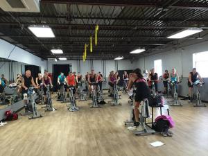 Elaine Dernoga leads her 1,000th spin class at RISE Fitness + Adventure in Lewes Nov. 2. BY SUBMITTED PHOTO