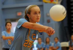 Beacon's Jenna Nolan gets a dig in the 2-1 loss to Mariner. BY DAN COOK