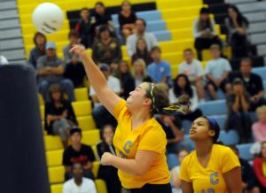 Mariner's Lucy Siranides powers home a kill shot. BY DAN COOK