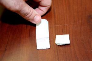 The stamp-sized baggies contain .015 grams of heroin, which can be cut with other powders. BY MELISSA STEELE