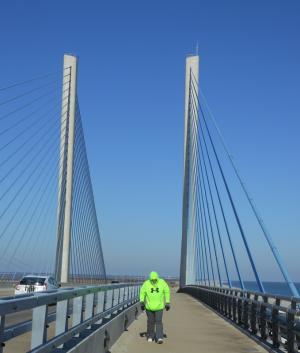Hill crossing the halfway point at the top of the Indian River Inlet bridge. BY CHRIS FLOOD