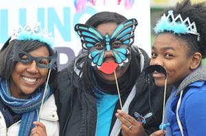 Enjoying the festivities before the walk are (l-r) Deidre Carter, Rachelle Purnell and Davina Copeland represent Delaware State University DANTE group, http://dante.org. BY DENY HOWETH