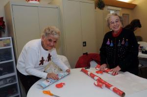 Happily working as a team are Terry Cassanelli, left, and Florida Robinson. BY STEVEN BILLUPS