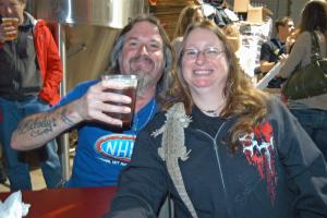 Laurel residents Bobby and Gina Jones celebrate Delaware Day at 16 Mile Brewery in Georgetown with their scaly friend, Bullet the bearded dragon. BY MADDY LAURIA