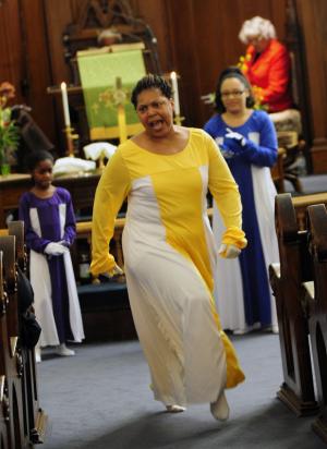 Tiasha Shockley of "We are Praise" performed a praise dance. BY DAN COOK
