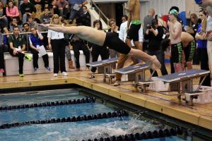 Cape's Ricky Brokaw takes off from the blocks during the 200 medley relay. Brokaw teamed with Cole Conrad, Mike Schrock and Jack Weeks to win with a time of 2:01.51. BY DAN COOK