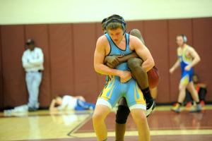 Jonah Robertson of Mariner thinks of his next move in the 170-pound title bout. Jonah hit the mat hard on his shoulder and had to default. BY DAVE FREDERICK