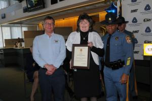 The Delaware State Police presented a Unit Commendation to the entire staff of the Georgetown DMV for the group effort that others besides the technicians performed. Shown are (l-r) Todd Lowe, inspection supervisor; Pam Smith, lane manager; and Col. Nathan McQueen, state police commander. BY STEVEN BILLUPS