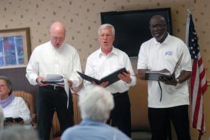 The three-man barbershop singers stand up for their performance. Shown are (l-r) Eric Kafka, Al Gratz and Howard Dahiell. BY STEVEN BILLUPS