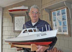 Warren Walls has built many replica models of real Coast Guard vessels and displays them throughout his Lewes home. BY NICK ROTH