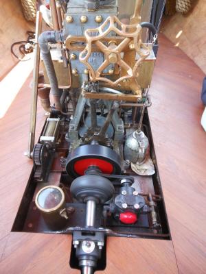 The boat is powered by a Tiny Power Steam Engine. LeGates salvaged the engine after a fire destroyed his first steam boat. BY CHRIS FLOOD